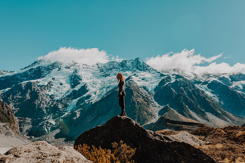 Student standing on mountain in New Zealand