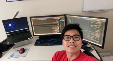Terry Phang working at a computer